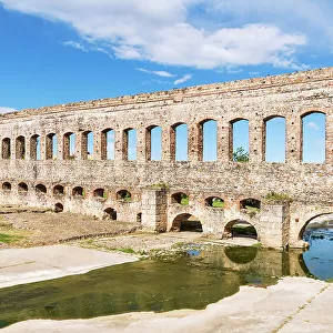 The Roman aqueduct of San Lazaro (Acueducto de San Lazaro) over the Albarregas river, built in the 1st century, Merida, Extremadura, Badajoz, Spain