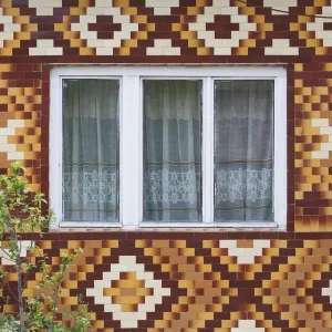 Romania, Transylvania, Viile Tecii, house detail with tile pattern