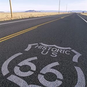 Route 66 Sign on Empty Road / Historic Route 66 Highway