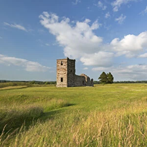 The ruins of Knowlton Church surrounded by countryside, Dorset, England. Summer (July)