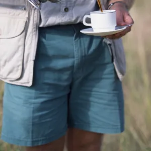 Safari guide pours coffee, Elsas Kopje