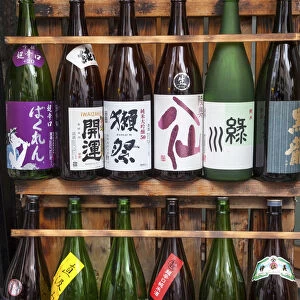 Sake bottles outside a restaurant in Tokyo, Japan