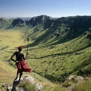 A Samburu warrior looks out across the eastern scarp