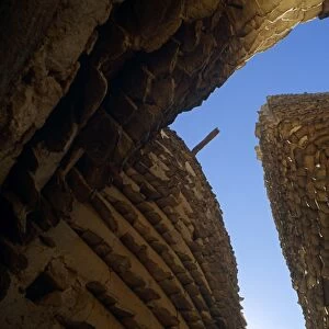 Saudi Arabia, Asir, Al-Alkhalaf. The village of Al-Alkhalaf is among the finest examples of the regions traditional forms of architecture (sometimes called raqaf) with tower-like houses with adobe walls (khulb) protected from erosion