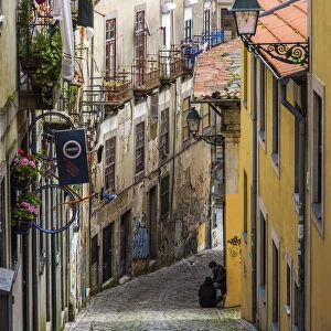 Scenic steep street in Ribeira district, Porto, Portugal