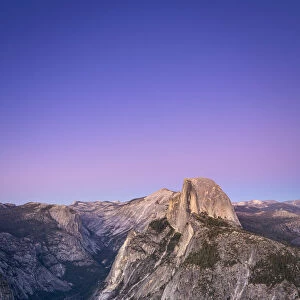 Scenic view of Half Dome granite rock formation at Yosemite National Park after sunset