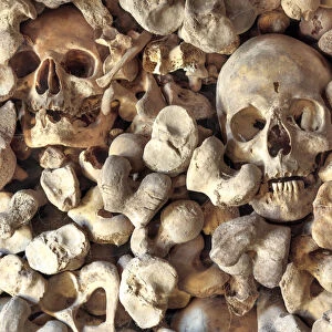 Sculls and bones, ossuary of the church of Santa Maria de Wamba, Valladolid, Castile