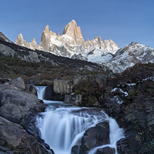 Secret waterfall and Fitz Roy at dusk, El Chalten, Santa Cruz province, Argentina