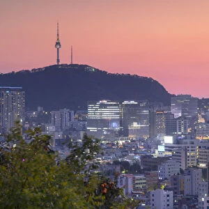 Seoul Tower and cityscape at sunset, Seoul, South Korea