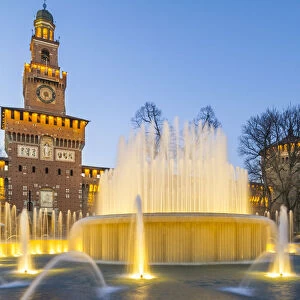 Sforzesco Castle with fountain at dusk. Milan, Italy, Europe