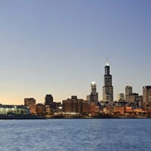 Shedd Acquarium and Chicago Skyline at dusk, Chicago, Illinois, USA