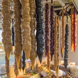 Shushukos for sale in Larnaca Cyprus. Shushukos is a dried grape jelly and walnut sweet