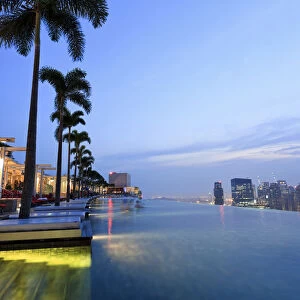 Singapore, swimmingpool and Singapore Skyline on the 57th floor of Marina Bay Sands