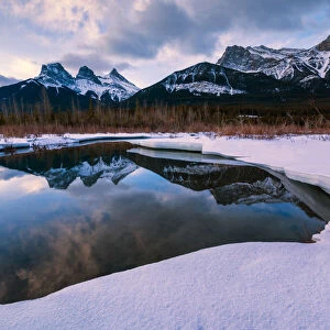 Three Sisters Reflecting in Bow River, Aberta, Canada