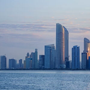 Skyline of the city center at sunrise, Abu Dhabi, United Arab Emirates