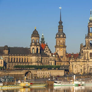 Skyline of Dresden with Bruehl's Terrace, Hofkirche, Residential palace and paddle steamer on river Elbe, Dresden, Saxony, Germany