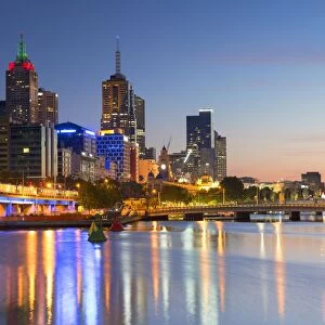 Skyline along Yarra River at dawn, Melbourne, Victoria, Australia