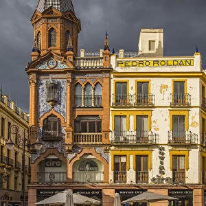Small square with outdoor cafe in Seville, Andalusia, Spain