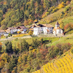 The small village of San Pietro, above colors of autumn, Merano, Sudtirol, Italy