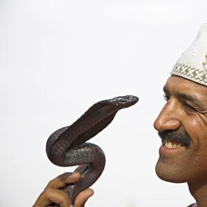 A snake charmer performs in the Djemaa el Fna, Marrakech