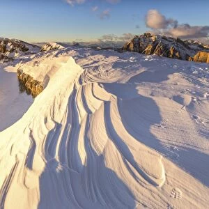 Snow waves between rocks, Mount Lagazuoi, Cortina d Ampezzo, Belluno district, Veneto