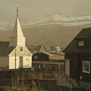 Snowfall in the village of Famjin. Suðuroy, Faroe Islands