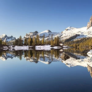 Snowmelt the lake Federa, Shelter Palmieri at Croda da Lago, Dolomites, Belluno, Veneto