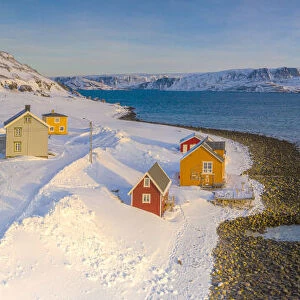 Snowy road in the coastal village of Veines, Kongsfjord, Varanger Peninsula