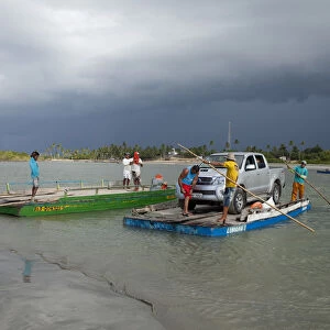 South America, Brazil, Ceara, Camocim, storm clouds over the ferry rafts at Guriu