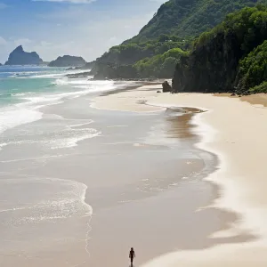 South America, Brazil, Pernambuco, Fernando de Noronha Island, a young woman walking