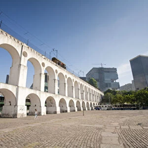 South America, Brazil, Rio de Janeiro, the Lapa arches aqueduct and tram line with