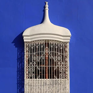 South America, Peru, La Libertad, Trujillo, a traditional iron lattice colonial window
