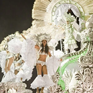 South America, Rio de Janeiro, Rio de Janeiro city, costumed dancers at carnival in