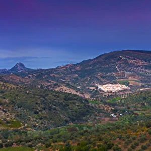 Spain, Andalucia, Cadiz province, Torre Alhaquime, view over valley to town at dusk