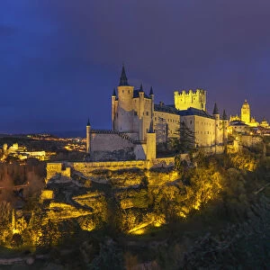 Spain, Castile and Leon, Segovia, the Alcazar and cathedral at night