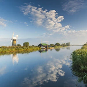 St. Benets Mill Reflecting in River Thurne, Norfolk, England