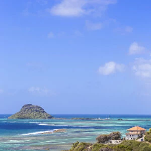St Vincent and The Grenadines, View of beach on Union Island, with Frigate Island