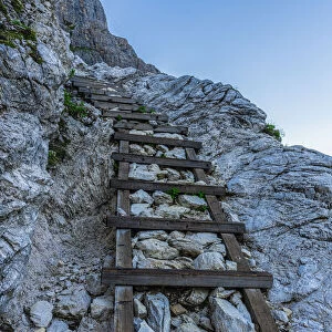 Staircase on steep mountain ridge on path to Rifugio Zsigmondy Comici hutte