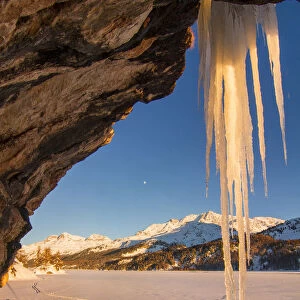 Stalactites in winter. Engadine valley, Switzerland, Europe