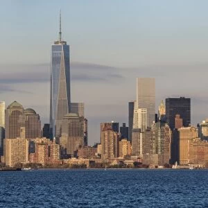 Statue of Liberty, One World Trade Center and Downtown Manhattan across the Hudson River