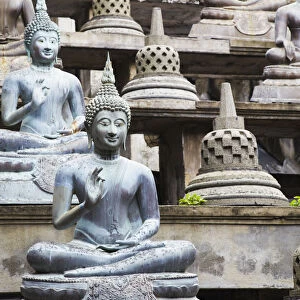 Statues at Gangaramaya temple, Cinnamon Gardens, Colombo, Sri Lanka
