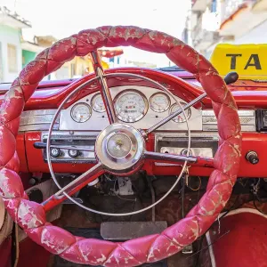 Steering wheel and dashboard in a classic car in Trinidad, Sancti Spiritus, Cuba Steering wheel and dashboard in a classic car in Trinidad, Sancti Spiritus, Cuba
