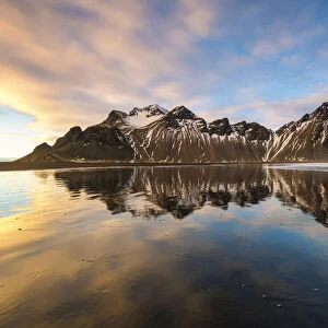 Stokksnes, Hofn, East Iceland, Iceland. Vestrahorn mountain reflected on the shore