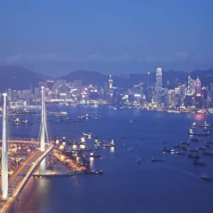 Stonecutters Bridge, Victoria Harbour and Hong Kong Island at dusk, Hong Kong, China