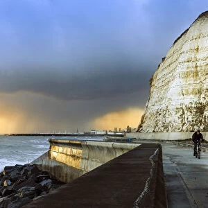 Storm clouds over the English Channel near Brighton with the white cliffs of Peacehaven