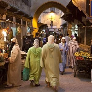 Street life on Talaa Kbira in the old medina of Fes, Morocco