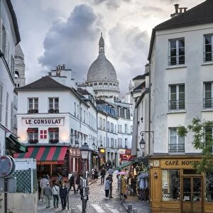 Streets of Montmartre with Sacre Coeur Basilica in the background, Paris, France