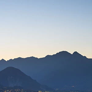 Stresa, Lake Maggiore, Piedmont, Italy. Borromean islands and Val Grande at dusk