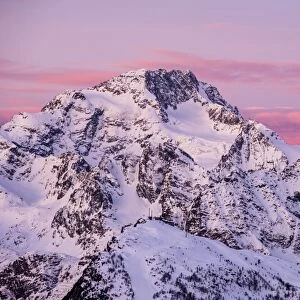 Sunrise on the Disgrazia mountain in winter, Malenco valley, Lombardy, Italy