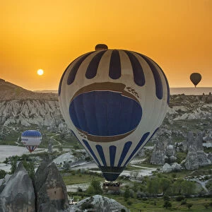 Sunrise landscape with hot air balloons, Goreme, Cappadocia, Turkey